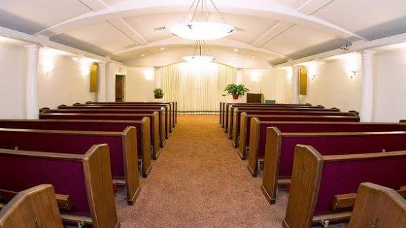Gentle Heart Funeral Home chapel interior with warm lighting and elegant decor