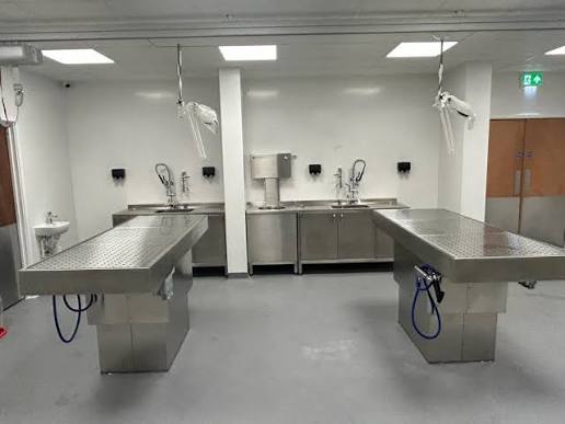 Professional embalming preparation room with modern equipment