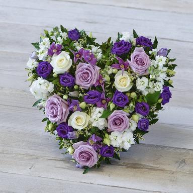 Full Casket Spray with seasonal blooms and greenery