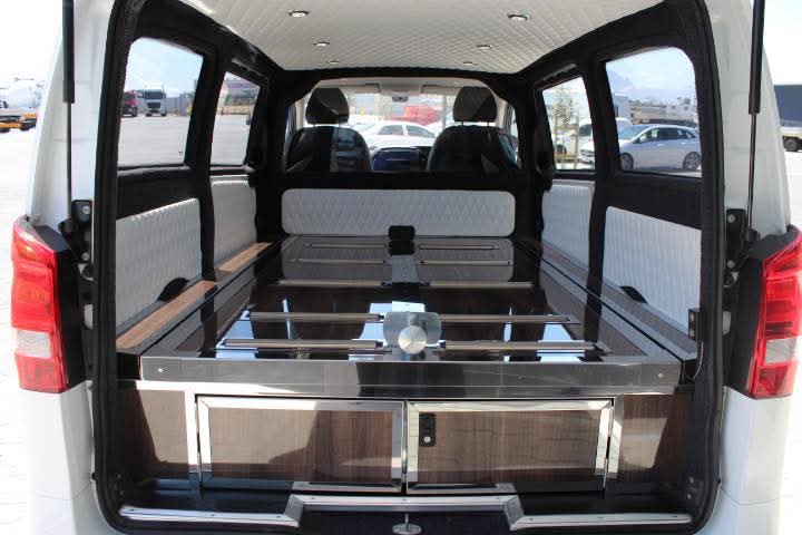 Elegant black hearse vehicle for funeral processions