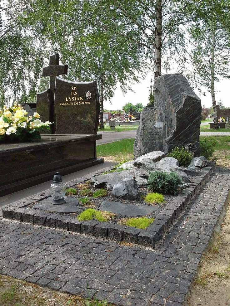 Angel Guardian memorial with carved angel figure on granite base